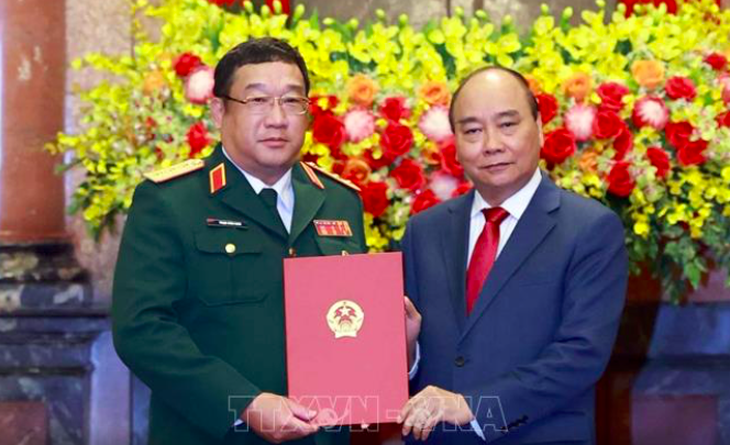 Chủ tịch nước trao quyết định thăng quân hàm thượng tướng cho thứ trưởng Bộ Quốc phòng - Ảnh 1.