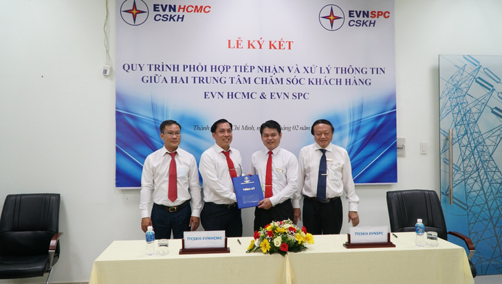 EVN SPC và EVN HCMC ký hợp tác cùng chăm sóc khách hàng sử dụng điện - Ảnh 1.