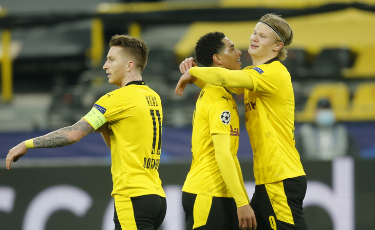 Haaland lại tỏa sáng, Dortmund loại Sevilla vào tứ kết Champions League - Ảnh 1.