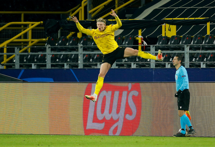 Haaland lại tỏa sáng, Dortmund loại Sevilla vào tứ kết Champions League - Ảnh 2.