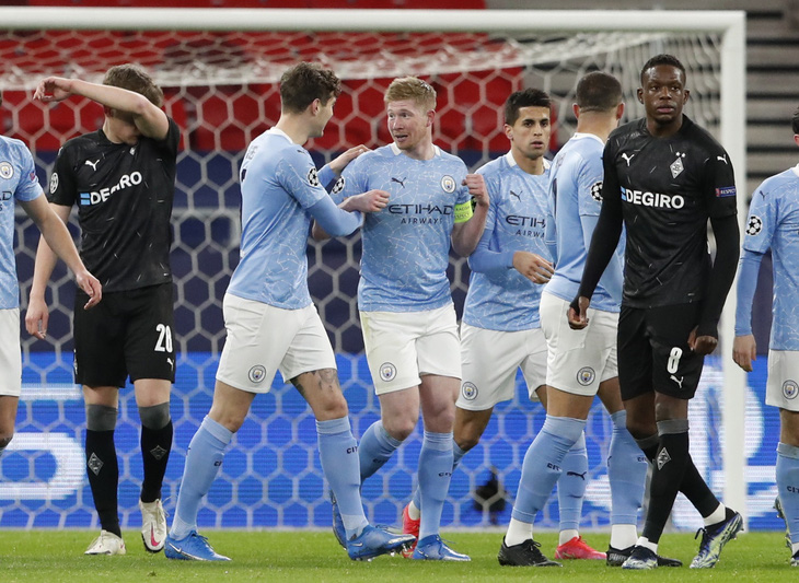 Man City dễ dàng ghi tên vào tứ kết Champions League - Ảnh 1.