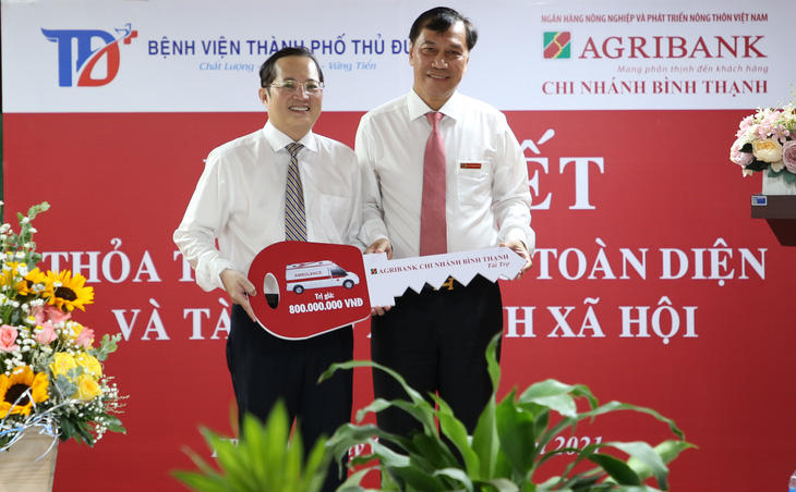 Agribank Chi nhánh Bình Thạnh ký kết thỏa thuận hợp tác với Bệnh viện TP Thủ Đức - Ảnh 2.