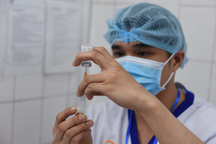 Tiêm vắc xin COVID-19 ở TP.HCM, Hà Nội và Hải Dương: Sau tiêm 30 phút đã trở lại làm việc - Ảnh 17.