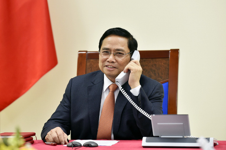 Thủ tướng Phạm Minh Chính mời Thủ tướng Singapore Lý Hiển Long thăm Việt Nam - Ảnh 1.