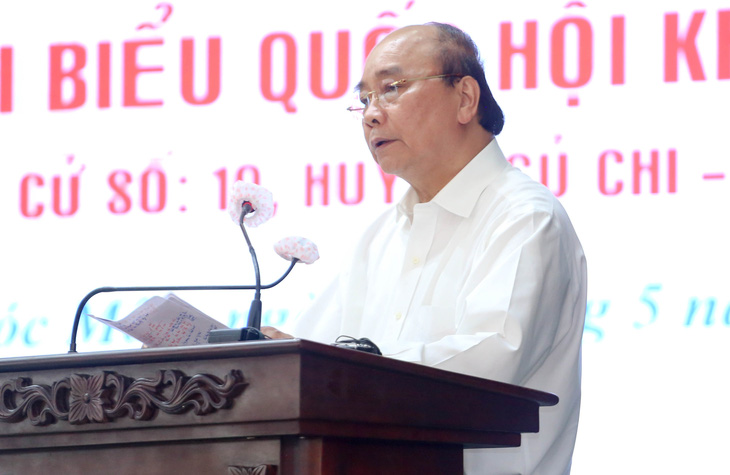 Chủ tịch nước Nguyễn Xuân Phúc: Không thể làm chính sách trong phòng lạnh - Ảnh 2.