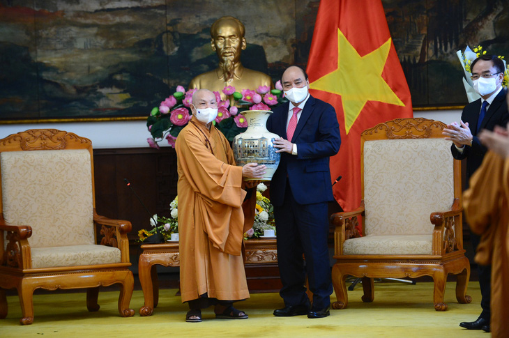 Chủ tịch nước Nguyễn Xuân Phúc: Phát huy các nguồn lực tôn giáo cho sự phát triển Việt Nam - Ảnh 2.