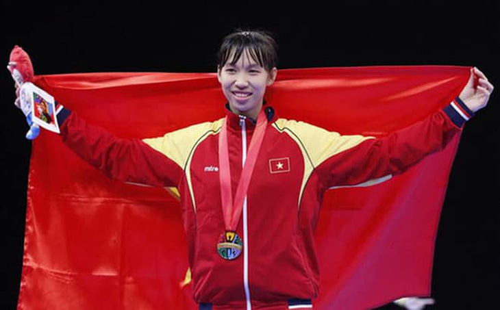 Nữ võ sĩ taekwondo Trương Thị Kim Tuyền giành vé đến Olympic Tokyo 2021 - Ảnh 1.