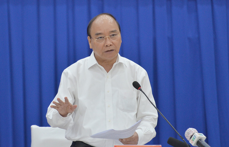 Chủ tịch nước Nguyễn Xuân Phúc kêu gọi cả nước chung tay đẩy lùi dịch bệnh - Ảnh 1.