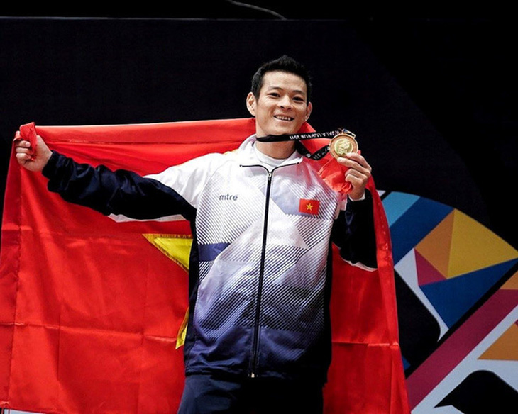 Cử tạ Việt Nam xuất sắc giành 3 vé đến Olympic Tokyo - Ảnh 1.