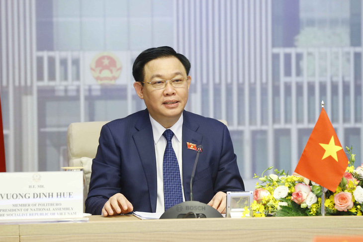 Việt Nam đề nghị chia sẻ kinh nghiệm tiếp cận vắc xin và công nghệ với Singapore - Ảnh 1.