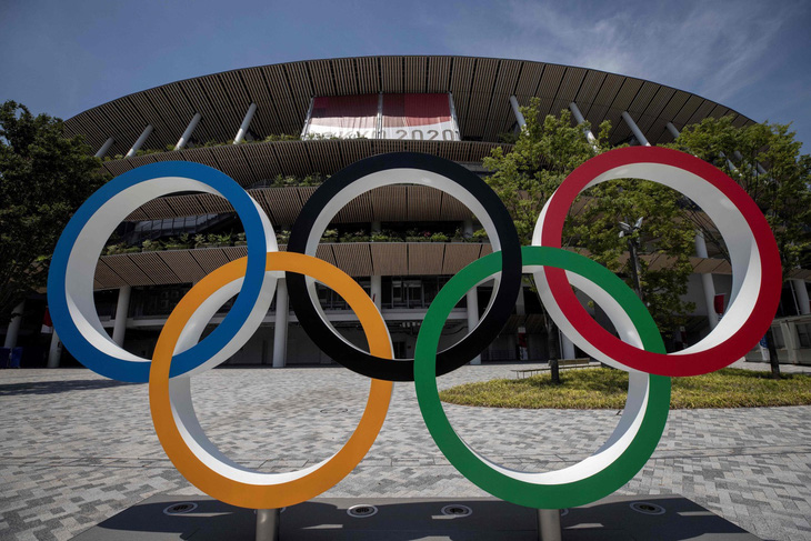 COVID-19 khiến công tác tổ chức Olympic Tokyo tốn kém nhất lịch sử - Ảnh 1.