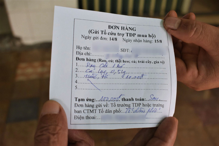 Điền phiếu gửi tổ cứu trợ, người Nha Trang được nhận hàng cần mua đưa đến tận nhà - Ảnh 3.