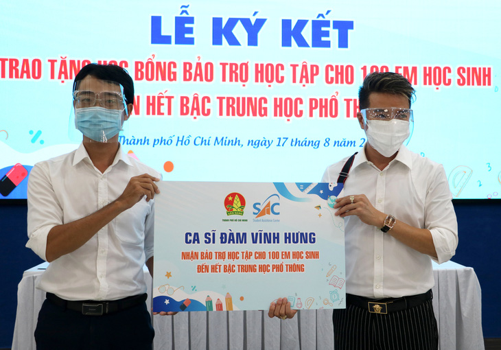 Đàm Vĩnh Hưng bảo trợ học tập cho 100 em có hoàn cảnh khó khăn do COVID-19 - Ảnh 1.