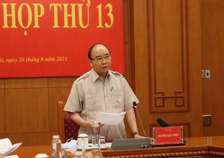 Chủ tịch nước Nguyễn Xuân Phúc: Phiên tòa xét xử trực tuyến là tất yếu - Ảnh 1.