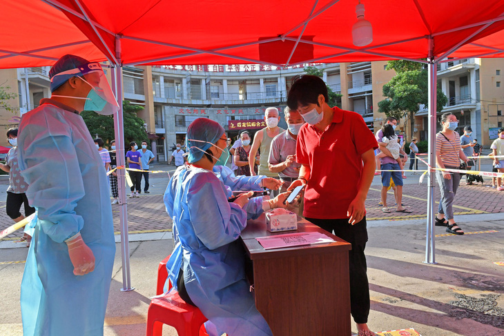 Số ca COVID-19 cộng đồng ở Phúc Kiến, Trung Quốc tăng theo cấp số nhân - Ảnh 1.