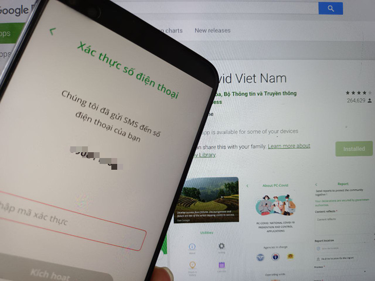 Người dùng phản ánh app PC-COVID ‘quay đều cả buổi’ - Ảnh 1.