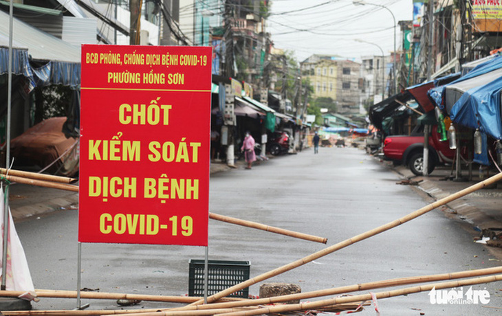 Dịch COVID-19 ngày 8-9: Nghệ An tiêm vắc xin cho tiểu thương để mở lại chợ dân sinh - Ảnh 2.