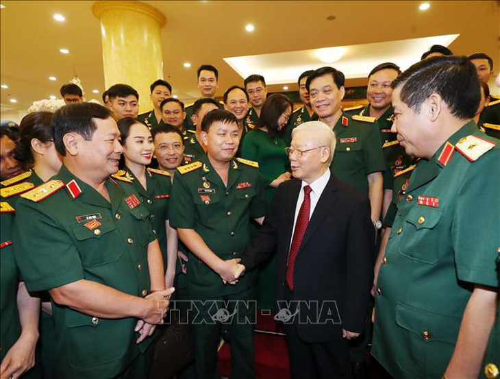 Tổng bí thư Nguyễn Phú Trọng gặp mặt các đại biểu thanh niên quân đội - Ảnh 1.