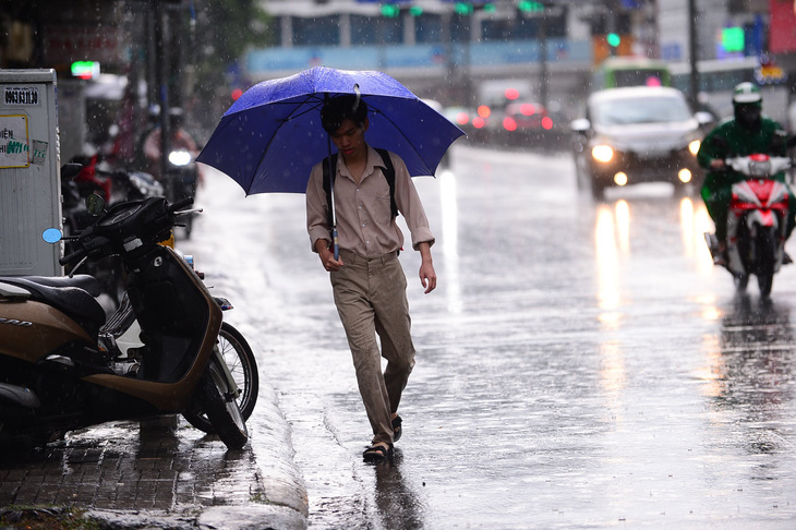 Thời tiết 21-11: Nhiều nơi mưa to, TP.HCM mưa từ sớm - Ảnh 1.