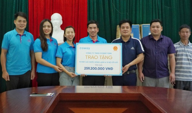 Coway Vina tài trợ 10 máy lọc nước cho người dân Mường Lát - Ảnh 1.