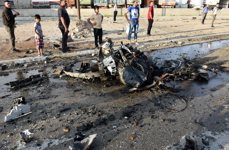Ít nhất 9 sĩ quan cảnh sát Iraq thiệt mạng vì đánh bom - Ảnh 1.