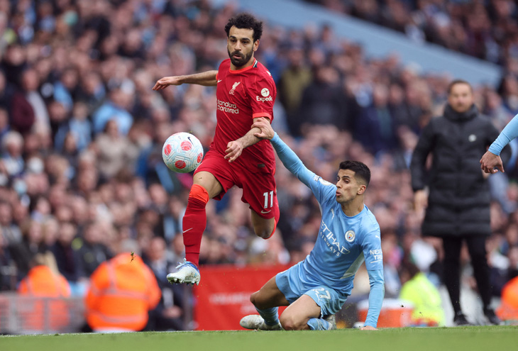 Liverpool và Man City chia điểm, cuộc đua vô địch tiếp tục kịch tính - Ảnh 1.