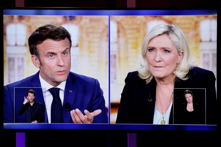 Le Parisien: Macron tấn công, Le Pen phòng thủ - Ảnh 2.