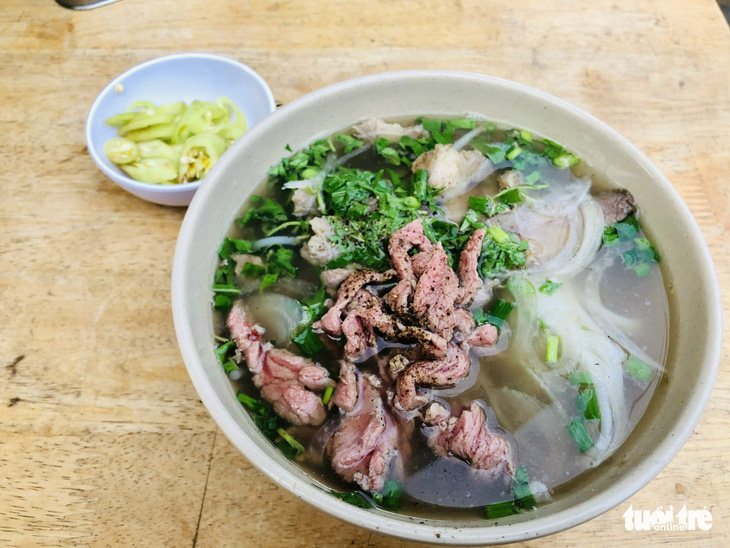 63 món ăn xếp thành bản đồ ẩm thực xác lập kỷ lục Việt Nam gồm món nào? - Ảnh 2.