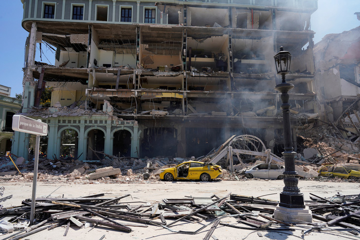 Nổ lớn tại khách sạn cổ ở thủ đô Cuba, ít nhất 18 người chết - Ảnh 6.