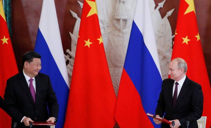 Chủ tịch Trung Quốc Tập Cận Bình và Tổng thống Nga Vladimir Putin điện đàm - Ảnh 1.