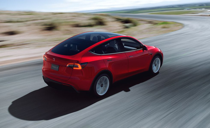 Tesla tiếp tục tăng giá bán ôtô điện - Ảnh 1.