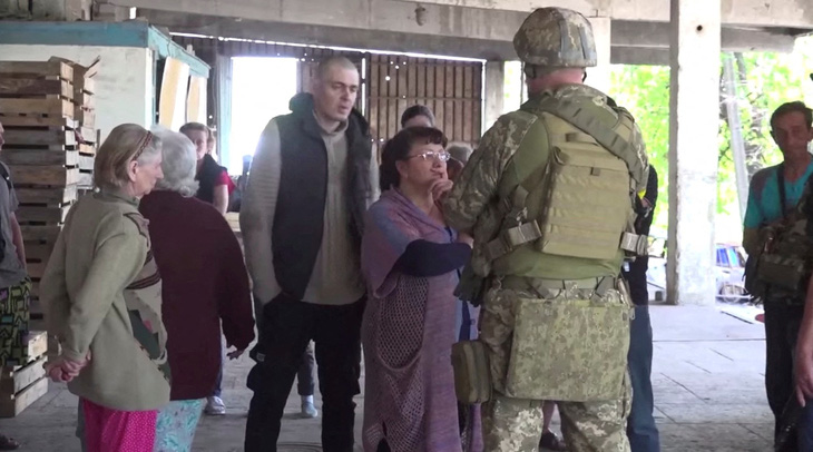 Nga, Ukraine cùng trao trả thi thể binh sĩ hy sinh - Ảnh 1.