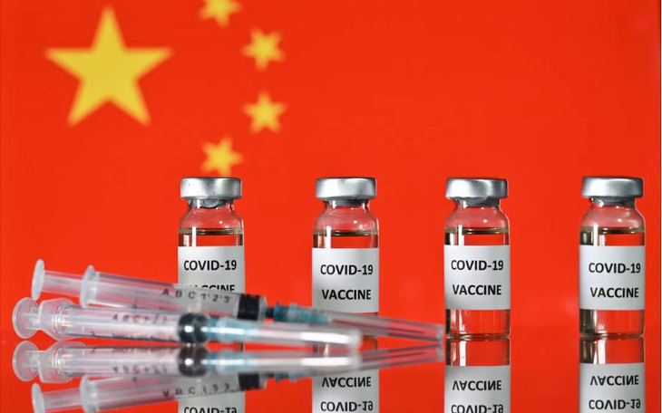 Trung Quốc khẳng định các lãnh đạo đều tiêm vắc xin COVID-19 nhà làm - Ảnh 1.