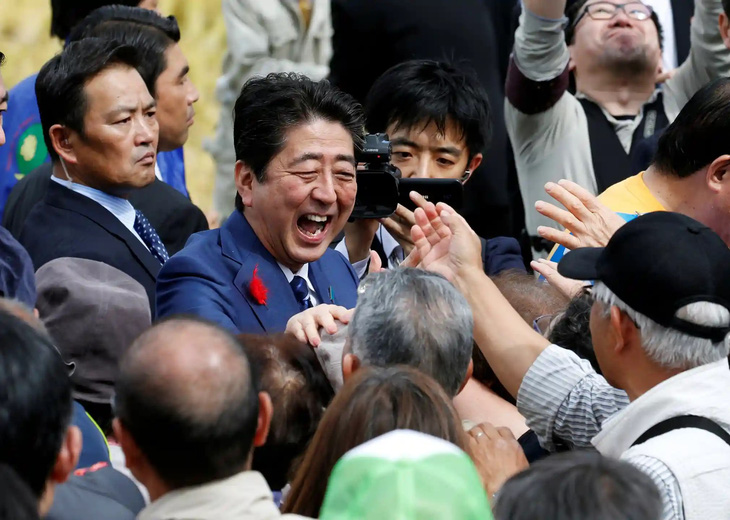 Cuộc đời cựu thủ tướng Nhật Bản Abe Shinzo qua ảnh - Ảnh 9.