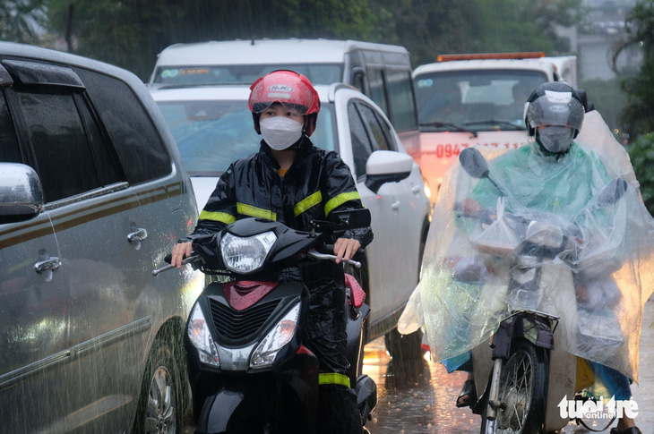 Thời tiết 14-8: Bắc Bộ duy trì mưa; Nam Bộ ngày nắng, chiều tối mưa rào - Ảnh 1.