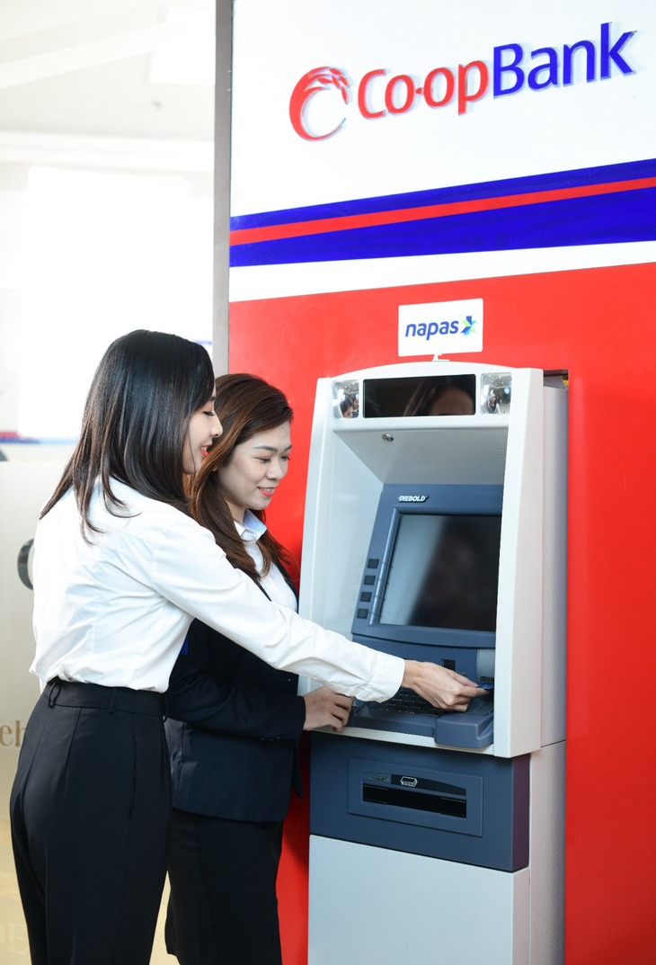 Co-opBank hợp tác với Quỹ tín dụng nhân dân triển khai dịch vụ ngân hàng số - Ảnh 2.