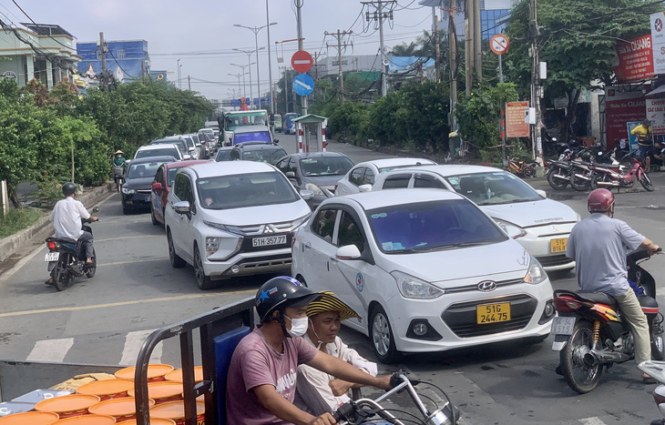 Thu phí không dừng trên cao tốc, xe ôtô qua phà Cát Lái tăng 60% - Ảnh 1.