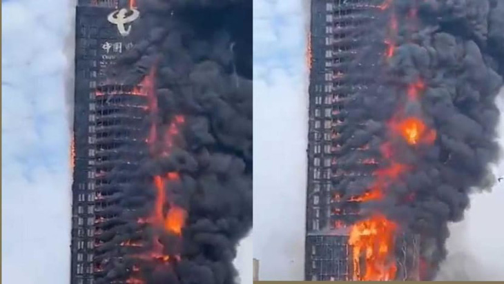Clip cháy ngùn ngụt tòa nhà chọc trời có văn phòng China Telecom, Trung Quốc - Ảnh 1.