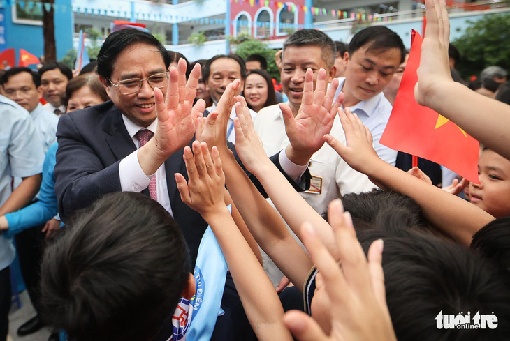 Thủ tướng Phạm Minh Chính: Đừng vì bệnh thành tích mà làm tổn thương trẻ - Ảnh 1.