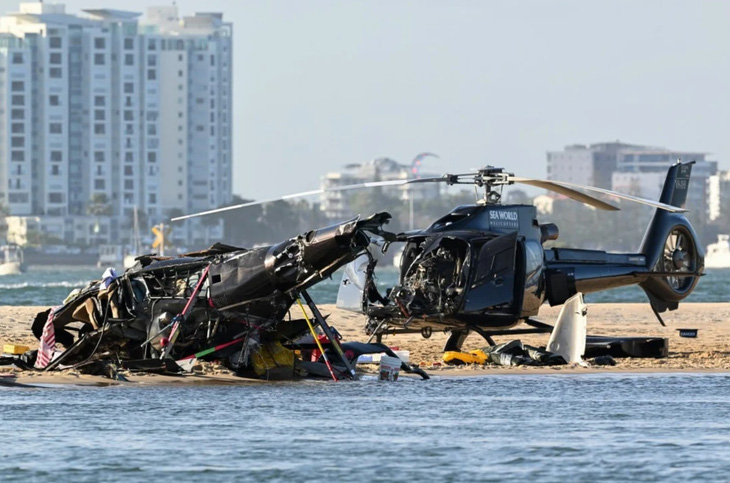 Hai máy bay trực thăng va chạm giữa không trung, 4 người chết và 3 người nguy kịch - Ảnh 2.