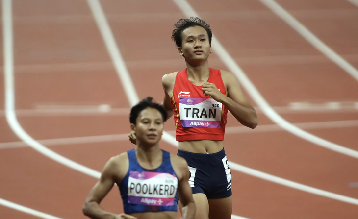 Trần Thị Nhi Yến giành vé vào chung kết 200m nữ - Ảnh: H.T