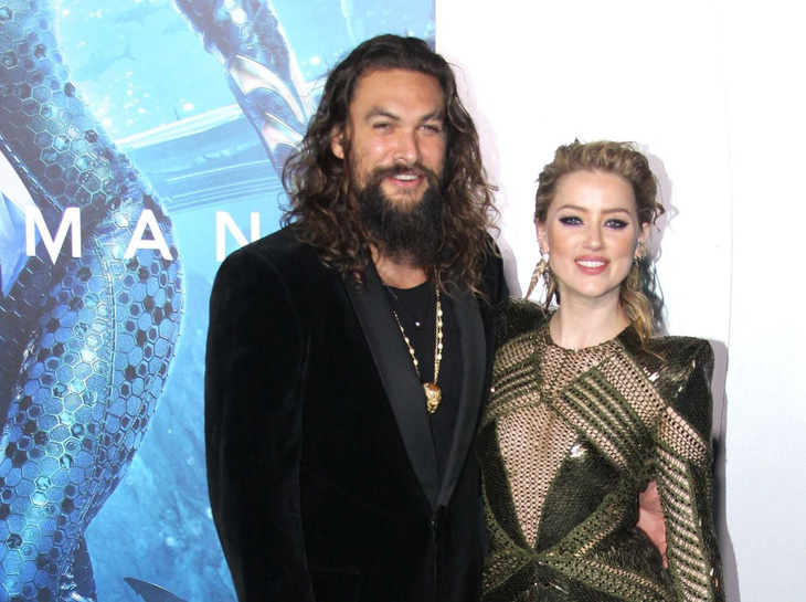 Cặp bạn diễn Jason Momoa và Amber Heard khi ra mắt Aquaman phần 1 - Ảnh: Getty Images