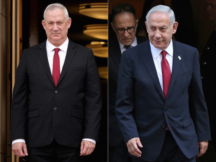 Cựu bộ trưởng quốc phòng Benny Gantz (trái) và Thủ tướng Israel Benjamin Netanyahu - Ảnh: AFP