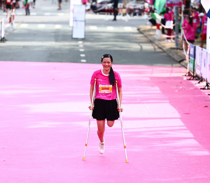 Chị Nguyễn Thị Minh Tâm - cô giáo khuyết tật được nhiều người biết đến như người truyền cảm hứng sống tích cực. Đây là lần thứ hai chị tham gia Giải marathon Đất sen hồng - Ảnh: Đ.TUYẾT