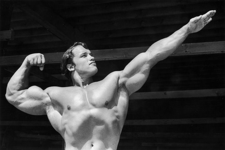 Arnold Schwarzenegger từng bị chê bai về hình thể và giọng nói - Ảnh: Men's Health