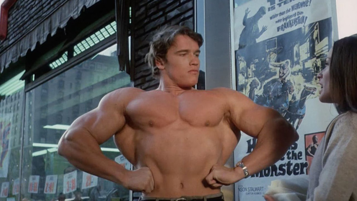 Arnold Schwarzenegger được biết đến với những vai diễn khoe cơ bắp - Ảnh: Cinema Blend