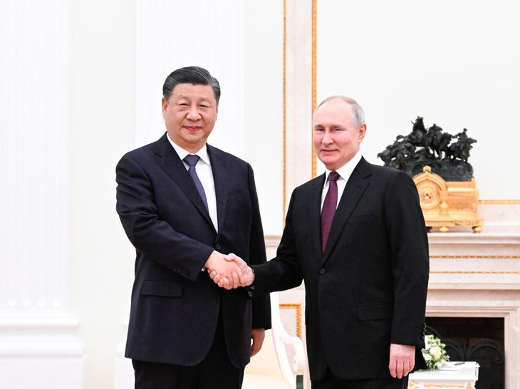 Chủ tịch Trung Quốc Tập Cận Bình (trái) gặp Tổng thống Nga Vladimir Putin tại Điện Kremlin khi ông Tập đến Matxcơva ngày 20-3 năm nay - Ảnh: TÂN HOA XÃ