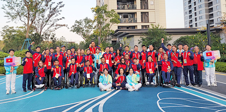 Đoàn thể thao người khuyết tật Việt Nam tại Asian Para Games 4 - Ảnh: NGỌC HÙNG