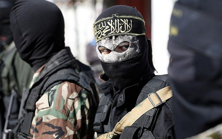 Chiến binh của lực lượng Jihad - nhóm chiến binh lớn thứ hai ở Gaza và chiến đấu song song với Hamas nhằm chống lại Israel - Ảnh: AFP
