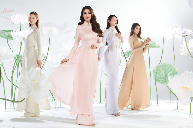Trương Ngọc Ánh và các người đẹp trong top 4 &quot;Miss Earth 2022&quot; diện trang phục áo dài truyền thống của Việt Nam - Ảnh: MILOR TRẦN